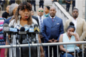 Gwen Carr, mother of chokehold victim Eric Garner, left, speaks outside the U.S. Attorney’s office, in the Brooklyn borough of New York, as Garner’s widow Esaw Snipes listens at right, Tuesday, July 16, 2019.